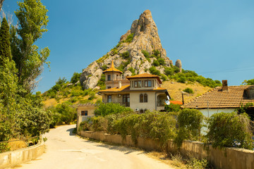 House With Honey Mountain On Background In Kurortnoe Settlement, Crimea, Russia.