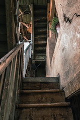Fototapeta na wymiar wooden stairs of an old house