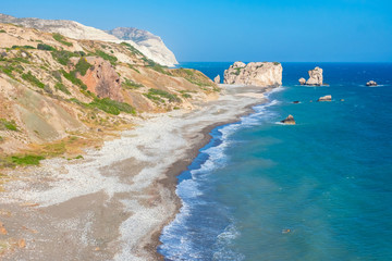 Cyprus. Aphrodite Bay. Aphrodite's rock, the view of the beach of Aphrodite. Petra Tou Romiou. Mediterranean sea. Sea cliff. Pathos. Kuklia. The beaches in Cyprus. Coast Of The Republic Of Cyprus.