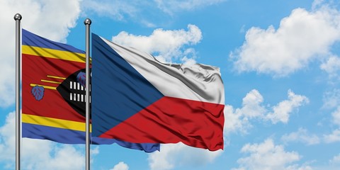 Swaziland and Czech Republic flag waving in the wind against white cloudy blue sky together. Diplomacy concept, international relations.