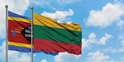 Swaziland and Lithuania flag waving in the wind against white cloudy blue sky together. Diplomacy concept, international relations.