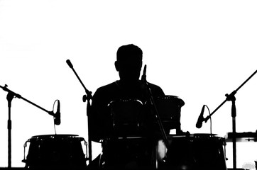 Silhouette of a drummer