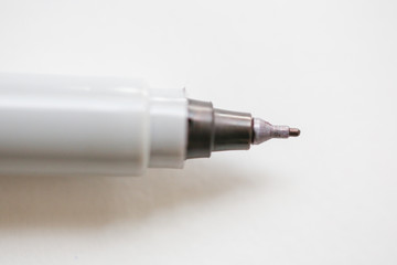 Pen point close-up on white background - Image