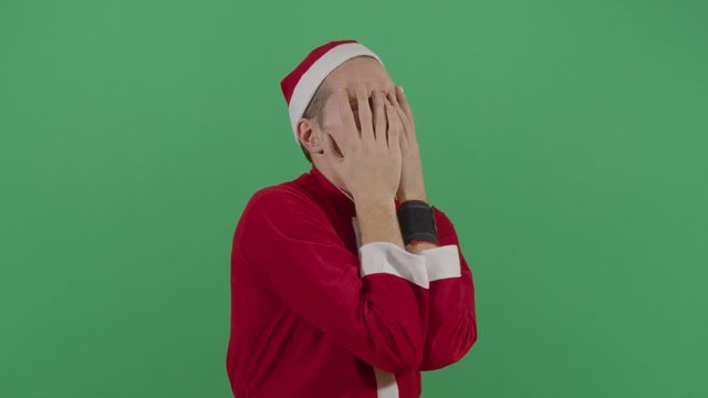Adult Man Santa Claus Rubbing His Face Frustated