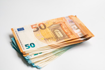 Euro bill money note pile bundle on white background