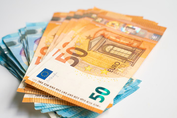 Euro bill money note pile bundle on white background