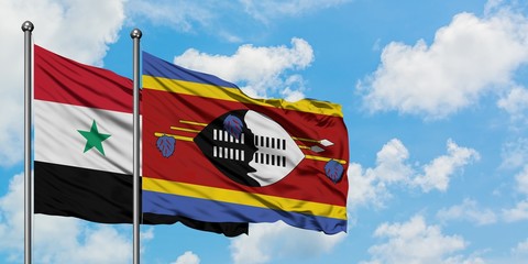 Syria and Swaziland flag waving in the wind against white cloudy blue sky together. Diplomacy concept, international relations.