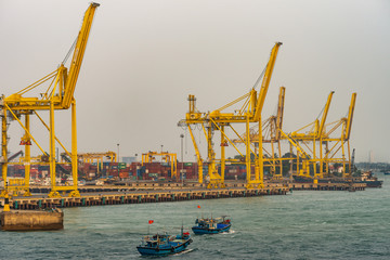 Da Nang, Vietnam - March 10, 2019: Tien Sa Port in Da Nang Bay. 2 blue fishing vessels return home...