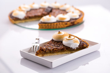 Christmas pecan pie topped with italian meringue 