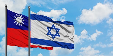 Taiwan and Israel flag waving in the wind against white cloudy blue sky together. Diplomacy concept, international relations.