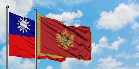 Taiwan and Montenegro flag waving in the wind against white cloudy blue sky together. Diplomacy concept, international relations.