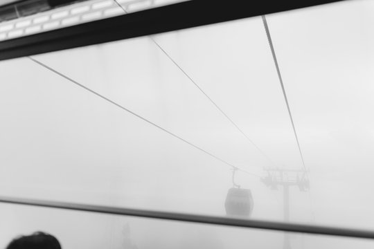 Cable car in a thick mist