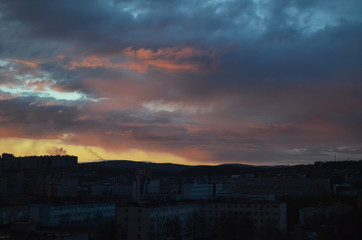 Silhouette City Sunset with clouds in Murmansk Russia with dramatic red, blue and ornage sky