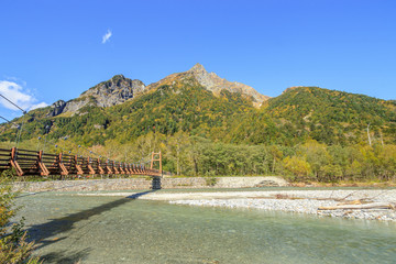 秋の上高地　穂高連峰と明神橋　長野県松本市　Kamikochi in autumn Hotaka mountain range and Myojin Bridge Nagano　Matsumoto city