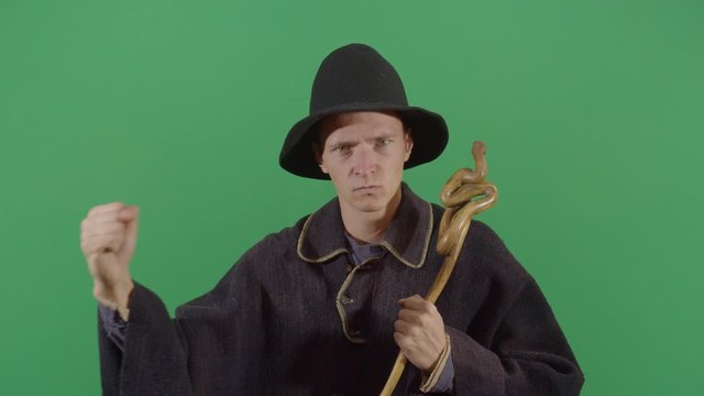 Rebellious Adult Man Magician Doing A Sign