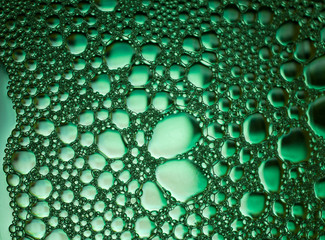 Foam green bubble texture. Abstract background and texture of green bubbles. 