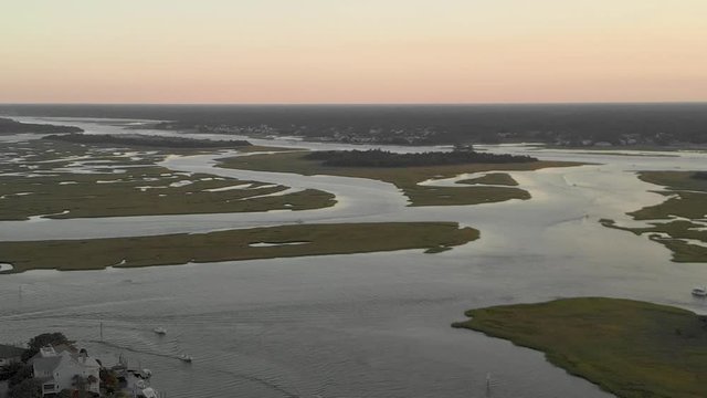 Aerial coastline flood plain Sunset 4K