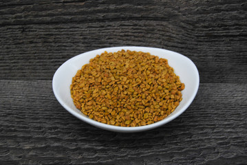 Dish of Fenugreek on a Rusic Background