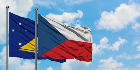 Tokelau and Czech Republic flag waving in the wind against white cloudy blue sky together. Diplomacy concept, international relations.