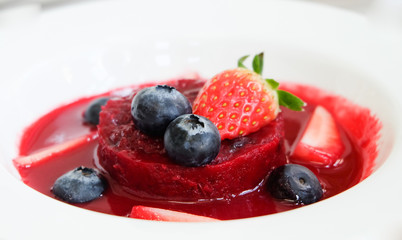 Summer pudding with berries and sauce