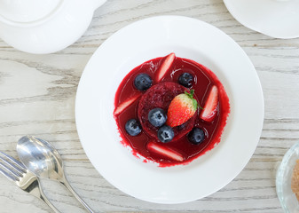 Summer pudding with berries and sauce