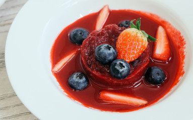Summer pudding with berries and sauce