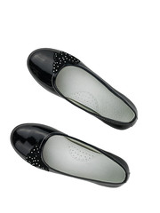 Top view of beautiful leather shoes for girl isolated on white background.