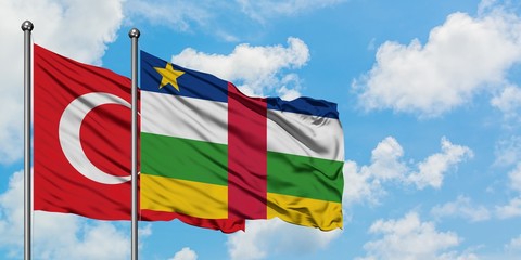 Turkey and Central African Republic flag waving in the wind against white cloudy blue sky together. Diplomacy concept, international relations.