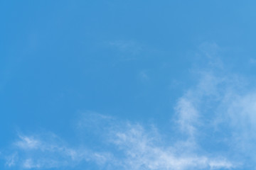 Naklejka na ściany i meble White cloud and blue sky background with copy space