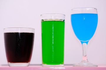 glass of drinks on white background