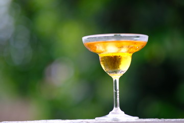 martini with green olives