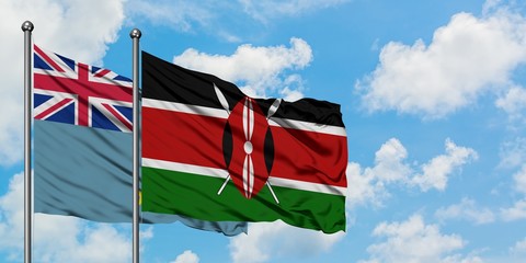 Tuvalu and Kenya flag waving in the wind against white cloudy blue sky together. Diplomacy concept, international relations.