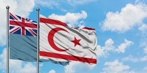 Tuvalu and Northern Cyprus flag waving in the wind against white cloudy blue sky together. Diplomacy concept, international relations.