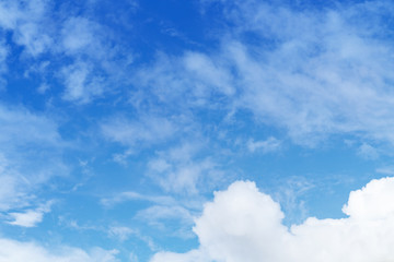 White cloud and blue sky background with copy space