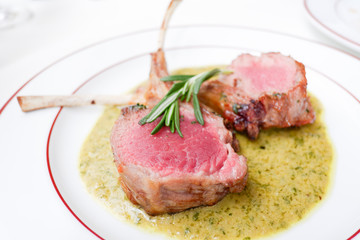 Roasted New Zealand lamb rack with rosemary crusted and Cafe de Paris sauce 