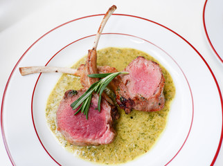 Roasted New Zealand lamb rack with rosemary crusted and Cafe de Paris sauce 