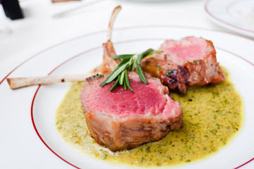 Roasted New Zealand lamb rack with rosemary crusted and Cafe de Paris sauce 