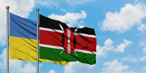 Ukraine and Kenya flag waving in the wind against white cloudy blue sky together. Diplomacy concept, international relations.