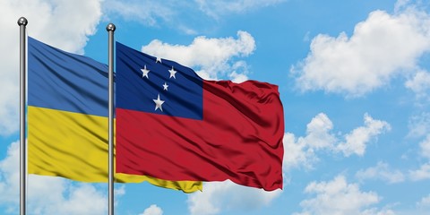 Ukraine and Samoa flag waving in the wind against white cloudy blue sky together. Diplomacy...