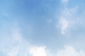 White cloud and blue sky background with copy space