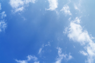 Naklejka na ściany i meble White cloud and blue sky background with copy space