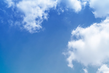 White cloud and blue sky background with copy space
