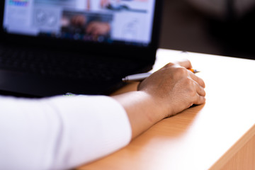 Female hand holding computer mouse