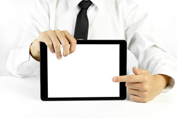 Businessman holding a tablet on white background