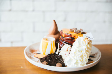 dessert on wood table in cafe