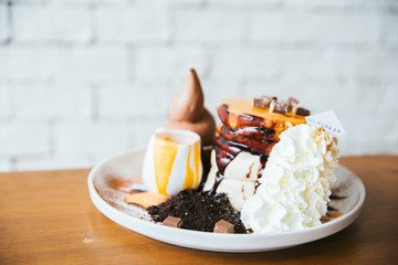 dessert on wood table in cafe