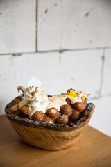 waffle hongkong in wood bowl