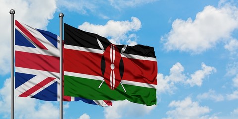 United Kingdom and Kenya flag waving in the wind against white cloudy blue sky together. Diplomacy concept, international relations.