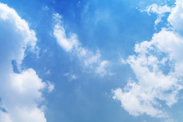 White cloud and blue sky background with copy space