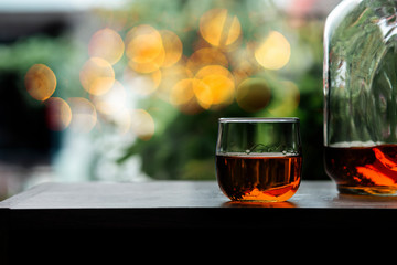 whiskey glass on wood bar
